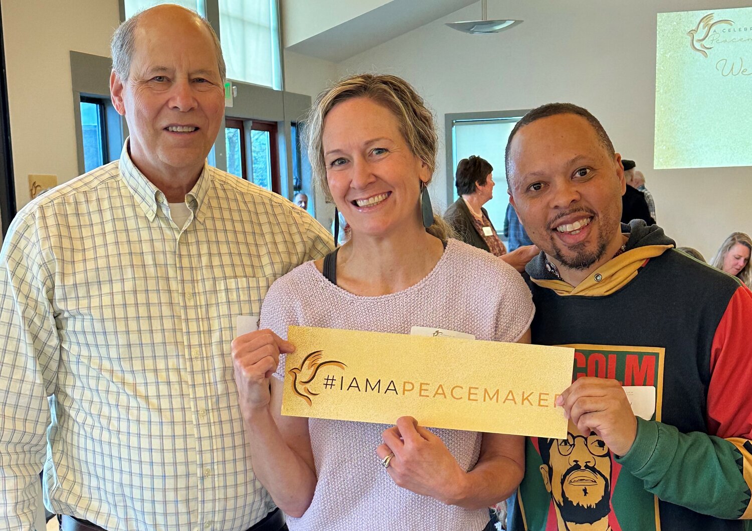 L to R: Steve Tilley, DRC 2019 Outstanding Volunteer; Anne Larsen; and Larry Jefferson Jr., Director of the Office of Public Defense, State of WA. Tilley and Jefferson nominated Anne Larsen for the 2023 Evan Ferber Peacemaker Award, May 7, 2023.